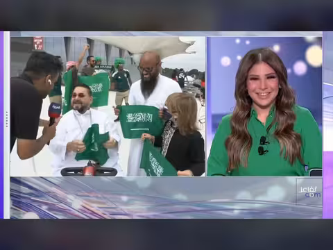 مشجعين من دول مختلفة يدعمون السعودية في مباراة إسبانيا