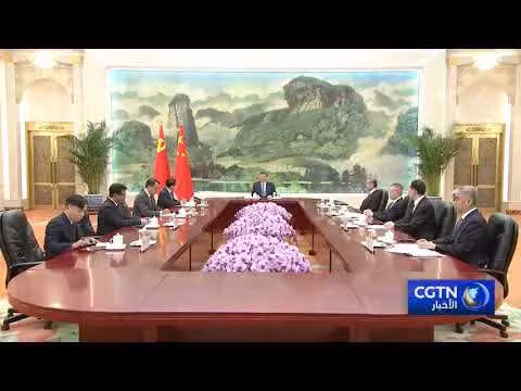 شي جين بينغ يلتقي بمبعوث لاوس