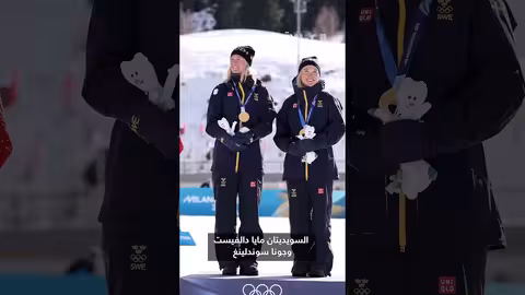 كلب ينضم إلى سباق التزلج الريفي في الألعاب الأولمبية الشتوية