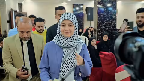 ماريا قحطان ترتدي الحجاب