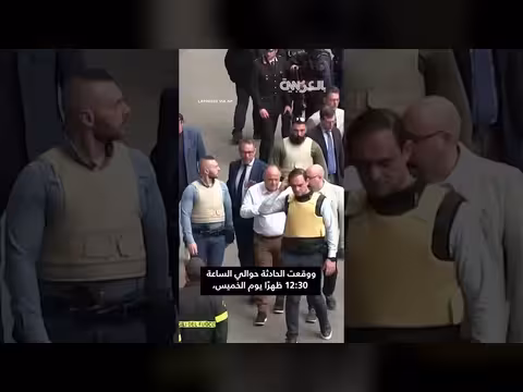 لصوص بأقنعة دالي يسرقون بنك ويحتجزون رهائن