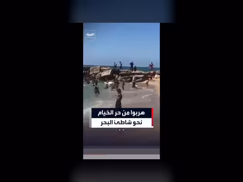 نازحون فلسطينيون يهربون من لهيب الخيام إلى شاطئ غزة