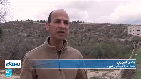 اقتلاع أشجار الزيتون في قريوت بالضفة الغربية المحتلة