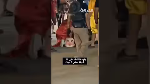 الشرطة التايلاندية تقبض على لص متنكرًا في مهرجان رأس السنة القمرية