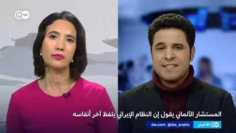 المستشار الألماني يتوقع سقوط النظام الإيراني