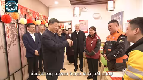 شي جين بينغ يزور عمال التوصيل